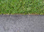 asphalt driveway edging installed next to grass