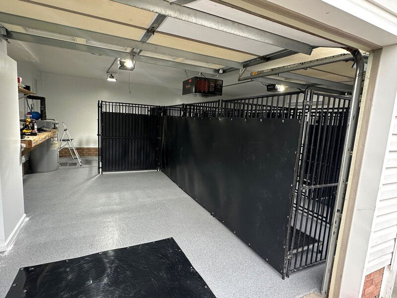 HDPE dog kennel panels lining kennels in a garage
