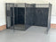 HDPE dog kennel panels installed on a kennel in a garage
